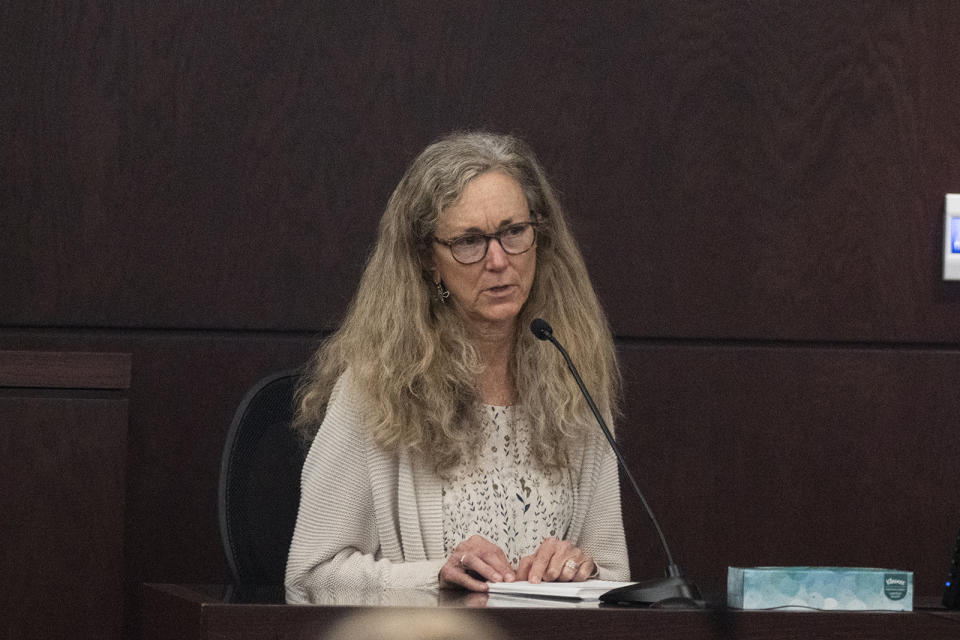 Karen Wilson, mother of Anna Moriah Wilson, speaks about her daughter to Kaitlin Armstrong after Armstrong was sentenced to 90 years for Wilson's murder at the Blackwell-Thurman Criminal Justice Center on Friday, Nov. 17, 2023, in Austin, Texas. Armstrong was found guilty of killing Anna Moriah Wilson in May 2022. (Mikala Compton/Austin American-Statesman via AP, Pool)