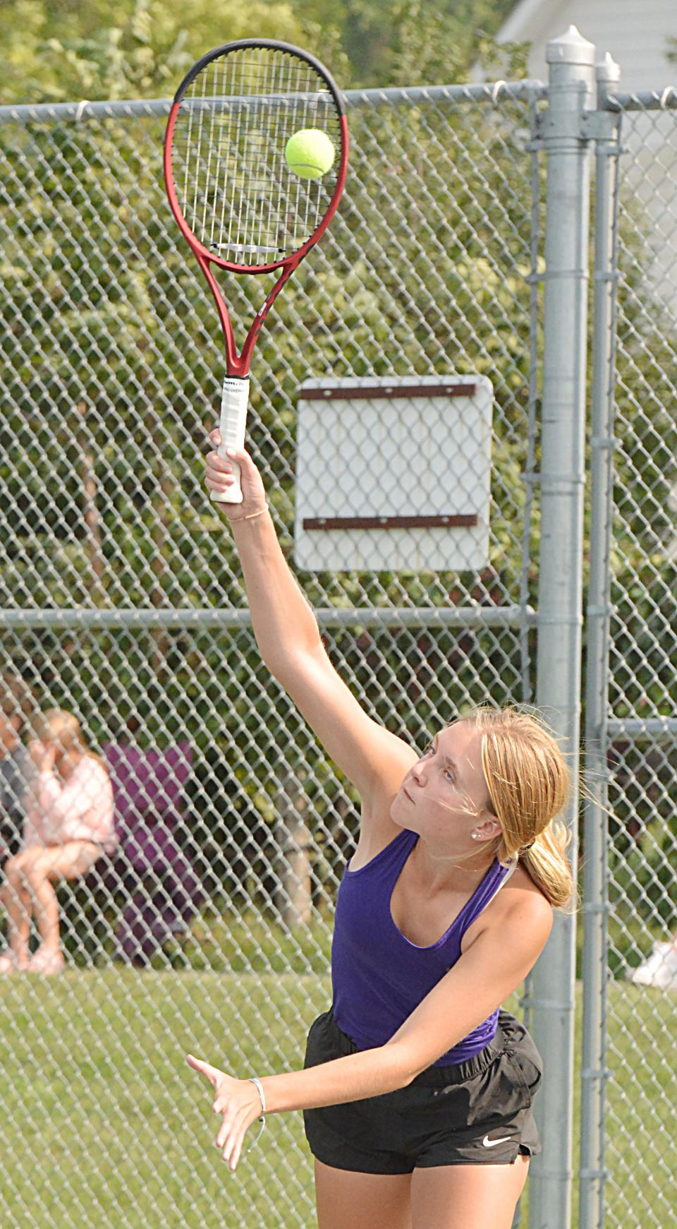 Ellie Zink of Watertown serves the ball during a high school girls tennis dual against Sioux Falls Lincoln on Tuesday, Aug. 29, 2023 at the Highland Park courts in Watertown.
