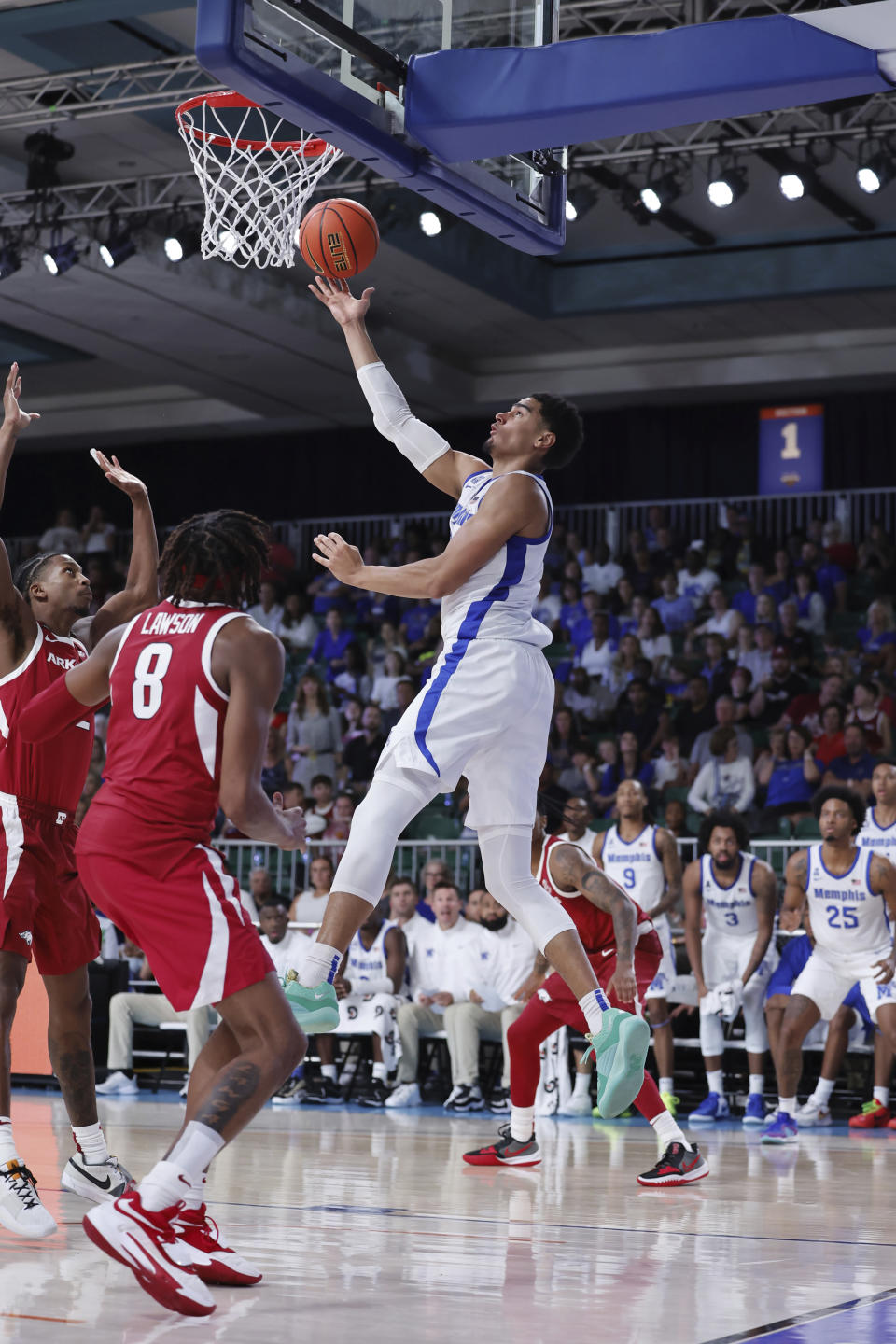 In a photo provided by Bahamas Visual Services, Memphis's Nick Jourdain shoots a lay up during the second half of an NCAA college basketball game in the Battle 4 Atlantis at Paradise Island, Bahamas, Thursday, Nov. 23, 2023. (Tim Aylen/Bahamas Visual Services via AP)