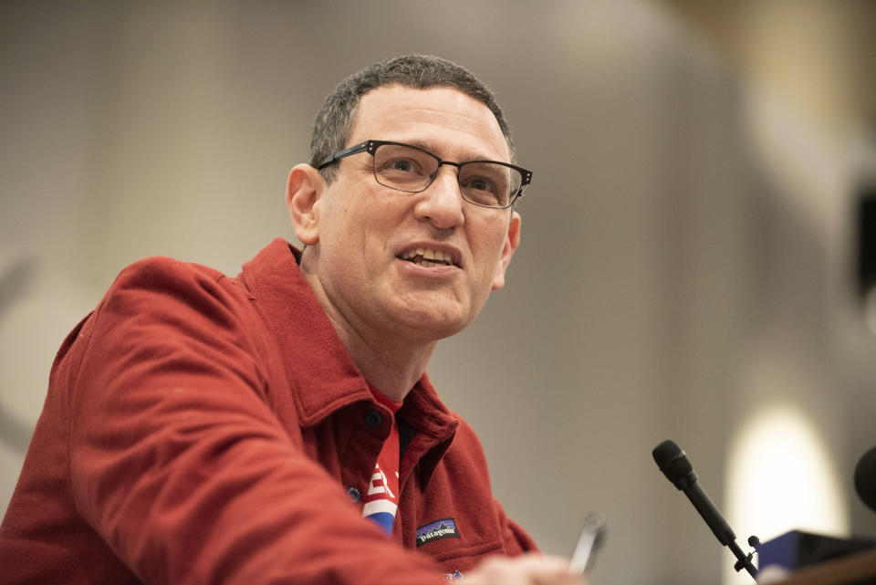 Chicago Teachers Union President Jesse Sharkey speaks during a news conference at the Chicago Teachers Union headquarters in Chicago on Sunday, Dec. 9, 2018. The nation's first teachers' strike against a charter school operator will end after their union and management struck a tentative deal Sunday that includes protections for students and immigrant families living in the country illegally. (Colin Boyle/The Beacon-News via AP)