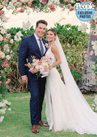 <p>Ashley Goodwin Photography</p> Dane Cook and Kelsi Taylor at their Sept. 23 wedding at a private estate in O’ahu, Hawaii.