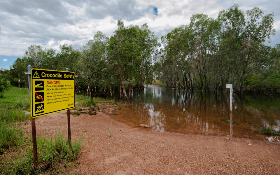 A sign warns of crocodiles in a watering hole in Kakadu.