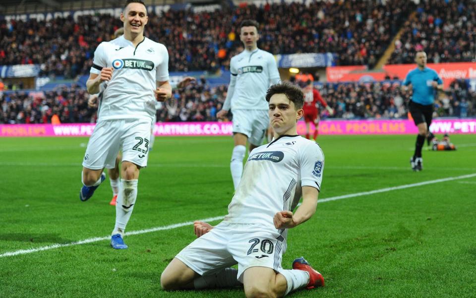 Swansea City's Daniel James celebrates scoring his side's second goal  - Getty Images Europe