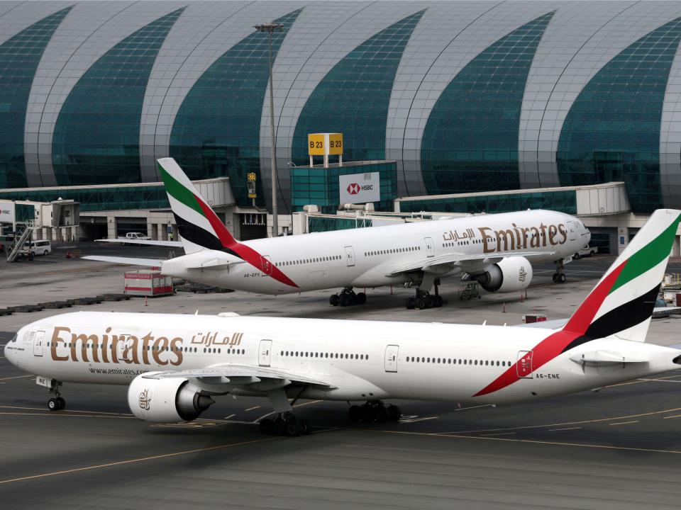 FILE PHOTO: Emirates Airline Boeing 777-300ER planes are seen at Dubai International Airport in Dubai, United Arab Emirates February 15, 2019. REUTERS/Christopher Pike/File Photo