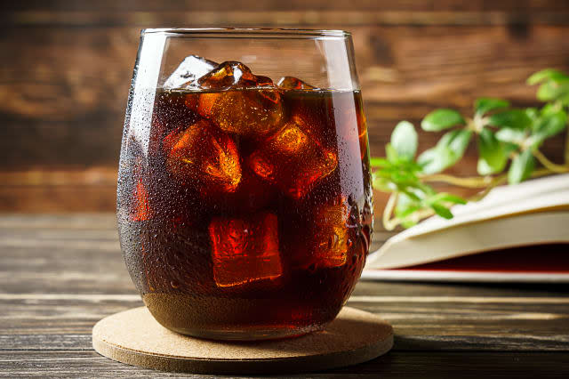 iced coffee on wooden table