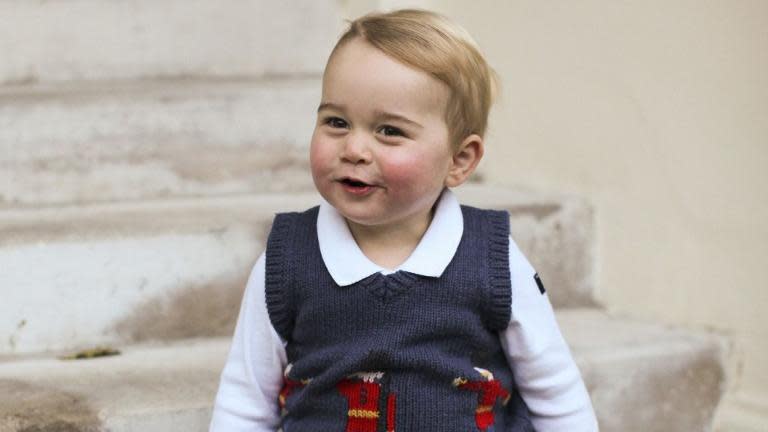 Three Christmas photos of a rosy-cheeked Prince George were released by Britain's royal family [Rex]