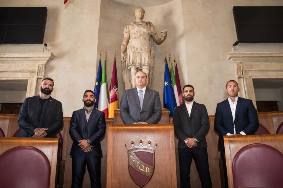 Bellator MMA President Scott Coker (center).