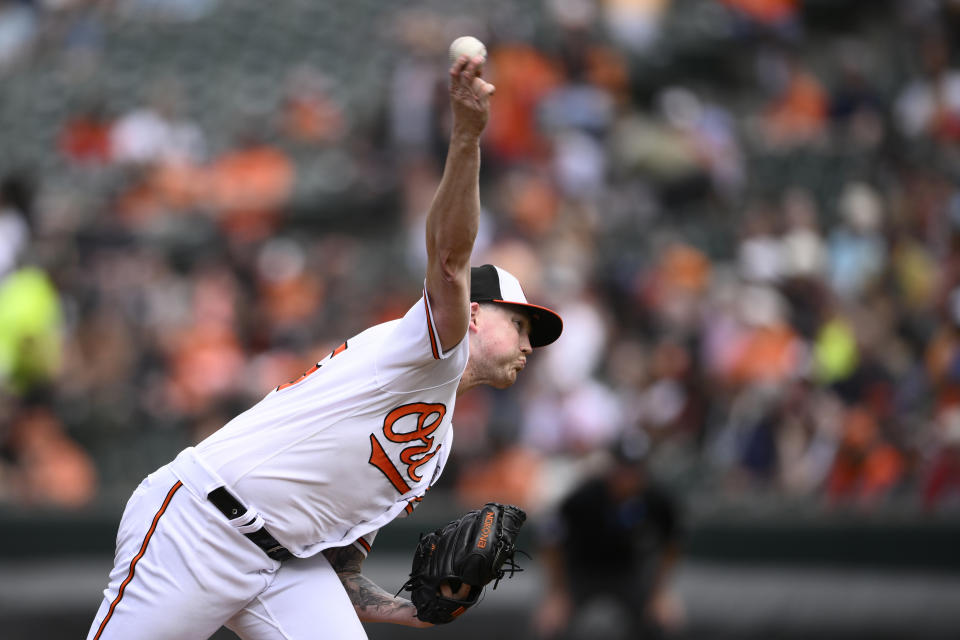 Baltimore Orioles starting pitcher Kyle Bradish throws during the third inning of a baseball game against the Texas Rangers, Sunday, May 28, 2023, in Baltimore. (AP Photo/Nick Wass)