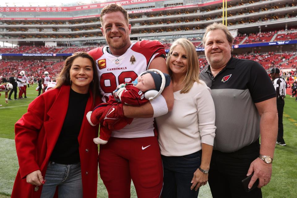 J.J. Watt of the Arizona Cardinals poses with his wife, son and parents prior to the game against the San Francisco 49ers at Levi's Stadium on Jan. 8, 2023, in Santa Clara, California. It was the final game of his NFL career.