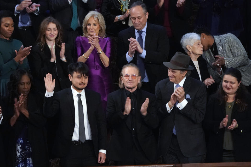 Brandon Tsay, who disarmed the accused gunman in a mass shooting last month in California, is recognized by President Joe Biden President Joe Biden as he delivers his State of the Union speech to a joint session of Congress, at the Capitol in Washington, Tuesday, Feb. 7, 2023. (AP Photo/J. Scott Applewhite)