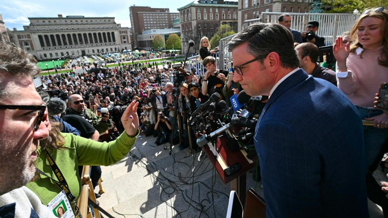 PHOTO: Speaker of the House Mike Johnson takes questions from the media on the campus of Columbia University in New York City on April 24, 2024.  (Timothy A. Clary/AFP via Getty Images)