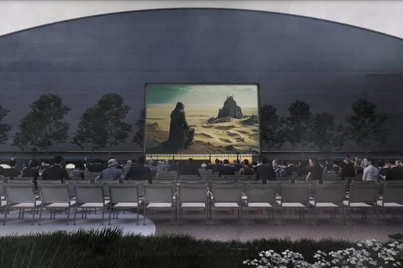 CGI of cinema screen with people watching in seats