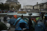 Extinction Rebellion climate change protester tents stand setup in Trafalgar Square, London, Friday, Oct. 11, 2019. Some hundreds of climate change activists are in London during a fifth day of protests by the Extinction Rebellion movement to demand more urgent actions to counter global warming. (AP Photo/Matt Dunham)