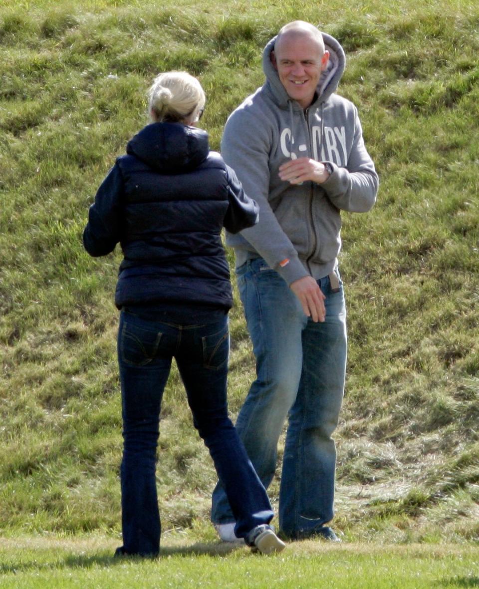 Zara and Mike Tindall playfighting