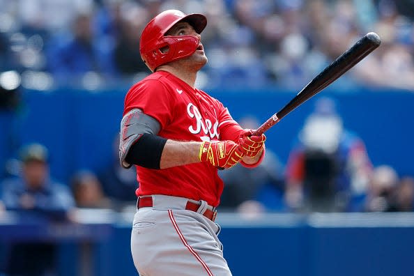 Joey Votto #19 of the Cincinnati Reds hits a solo home run in the eighth inning of their MLB game against the Toronto Blue Jays at Rogers Centre on May 22, 2022 in Toronto, Canada.