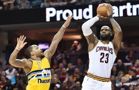 Feb 11, 2017; Cleveland, OH, USA; Cleveland Cavaliers forward LeBron James (23) shoots over Denver Nuggets guard Jameer Nelson (1) during the second half at Quicken Loans Arena. The Cavs won 125-109. Mandatory Credit: Ken Blaze-USA TODAY Sports