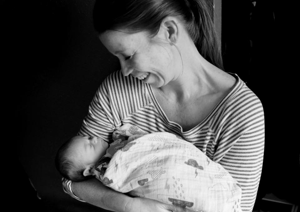 Michelle Marcotte holds baby Michael a few days after she began fostering him. 