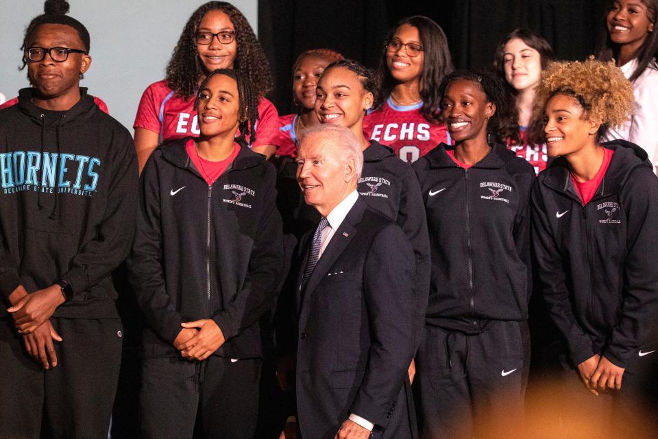 President Joe Biden takes photos with Delaware State University students after delivering remarks about student debt relief, part of his Lowering Costs for American Families initiative, during his visit to DSU in Dover, Friday, Oct. 21, 2022.