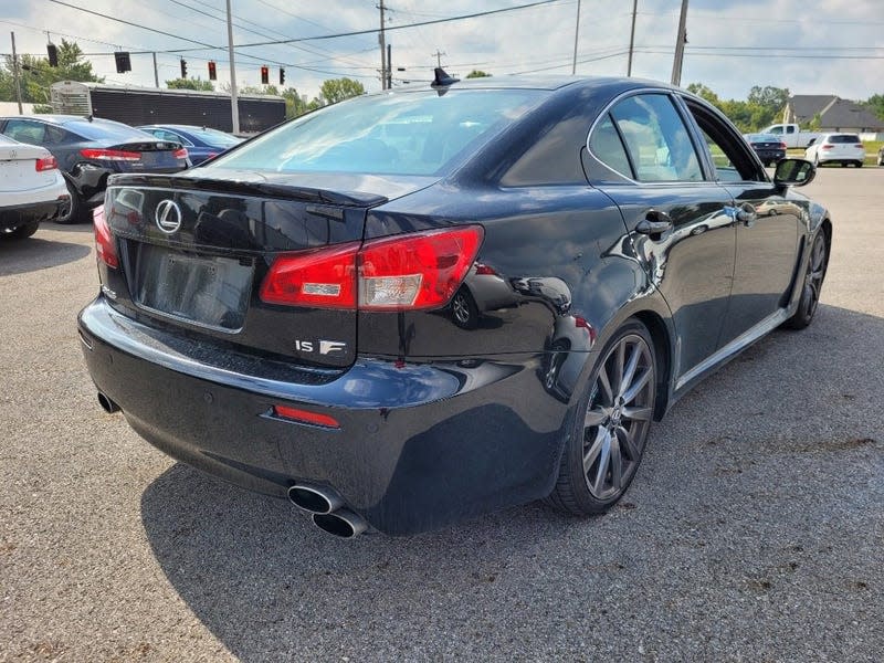 Rear 3/4 view of a black Lexus IS F