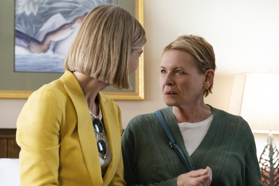 This image released by Netflix shows Rosamund Pike, left, and Dianne Wiest in a scene from "I Care A Lot." (Seacia Pavao/Netflix via AP)