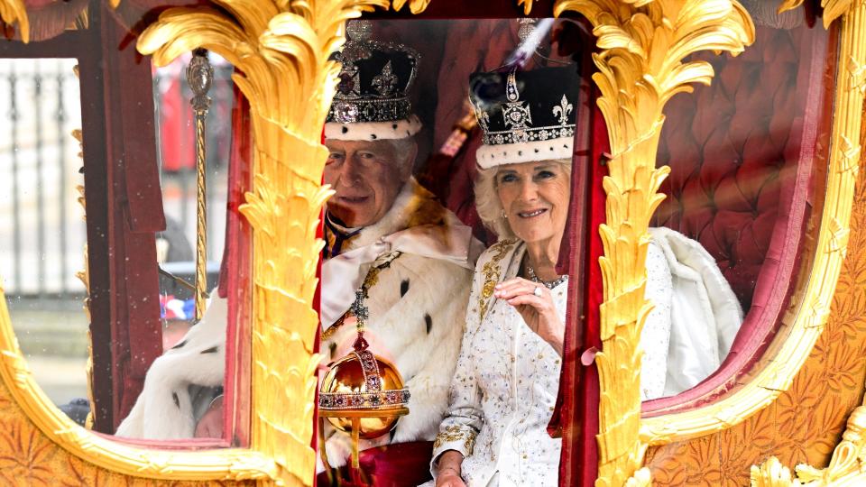 LONDON, ENGLAND - MAY 06: King Charles III and Queen Camilla travelling in the Gold State Coach built in 1760 and used at every Coronation since that of William IV in 1831sets off from Westminster Abbey on route to Buckingham Palace during the Coronation of King Charles III and Queen Camilla on May 06, 2023 in London, England. The Coronation of Charles III and his wife, Camilla, as King and Queen of the United Kingdom of Great Britain and Northern Ireland, and the other Commonwealth realms takes place at Westminster Abbey today. Charles acceded to the throne on 8 September 2022, upon the death of his mother, Elizabeth II.