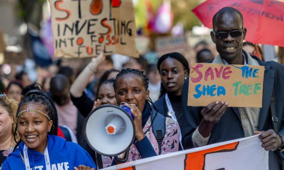 Climate activist Vanessa Nakate marches through central Stockholm with other campaigners during a protest organized by Fridays for Future.