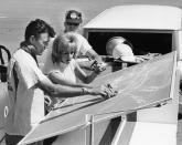 Carroll Shelby, one-time bright light in the world of car racing, uses a blackboard and toy car to instruct Terry Bagley in the fine points of fast driving at the school he operates in Riverside, Calif., April 2, 1964. A heart condition forced him out of competition,so he opened the school and a car-building business. (AP Photo)