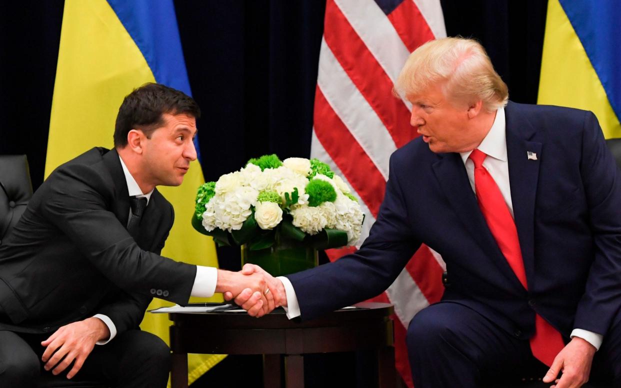 The inquiry was sparked by the revelation of a phone call in which Donald Trump asked Ukraine's president to investigate Joe Biden - AFP