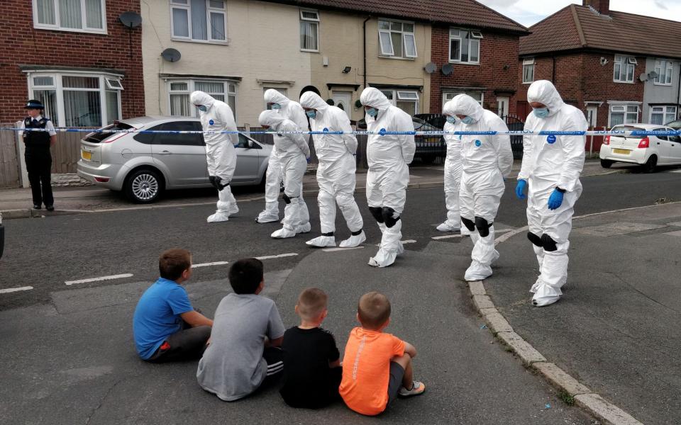 Fingertip search by forensics on the street in Knotty Ash, Liverpool following the shooting of nine-year-old Olivia Pratt-Korbel - Robyn Vinter/Guardian/eyevine