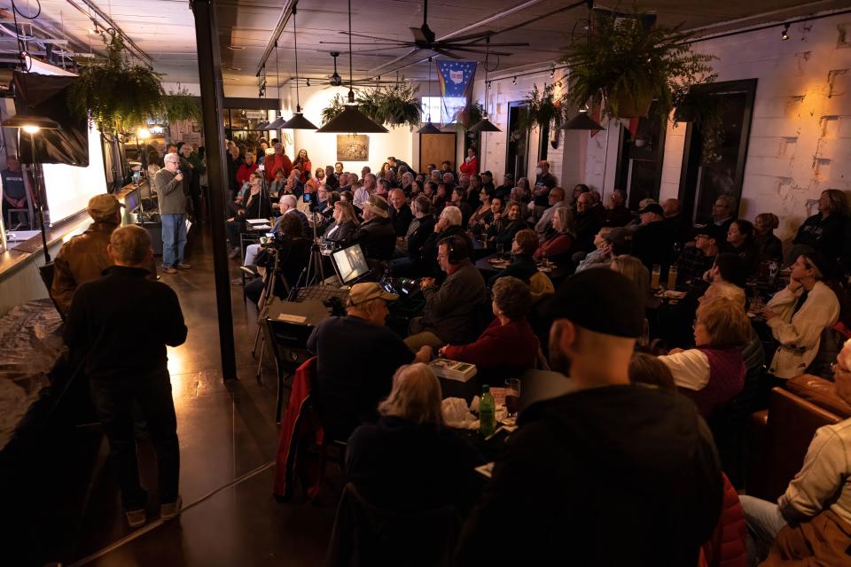 Chas Madonio, author of the new book “Bars, Bands, and Rock 'n Roll - The Golden Era in Kent, Ohio”, gives a presentation on Kent’s music scene during the late '60s and early '70s to a standing-room-only crowd at the North Water Brewing Co. in Kent.