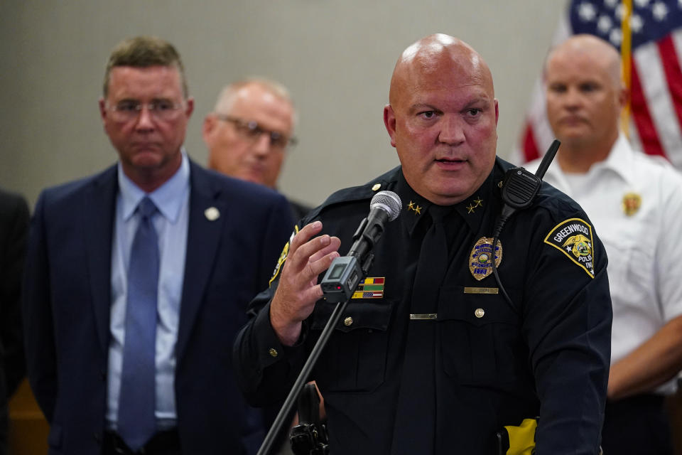 Greenwood Police Chief James Ison speak during a press conference at the Greenwood City Center in Greenwood, Ind., Monday, July 18, 2022. Police say three people were fatally shot and two were injured, including a 12-year-old girl, after Jonathan Douglas Sapirman, 20, opened fire with a rifle in a food court and an armed civilian shot and killed him. (AP Photo/Michael Conroy)