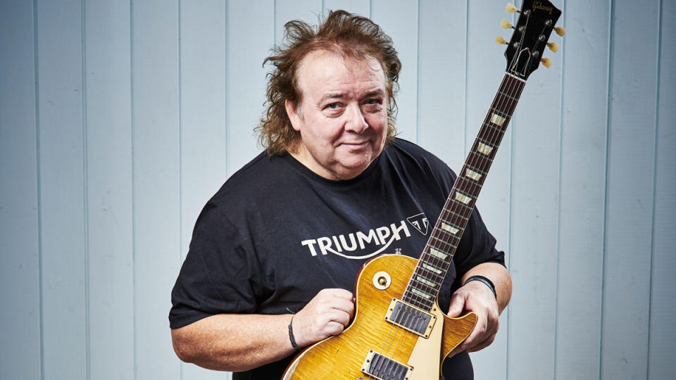 Bernie Marsden holding a Gibson Les Paul