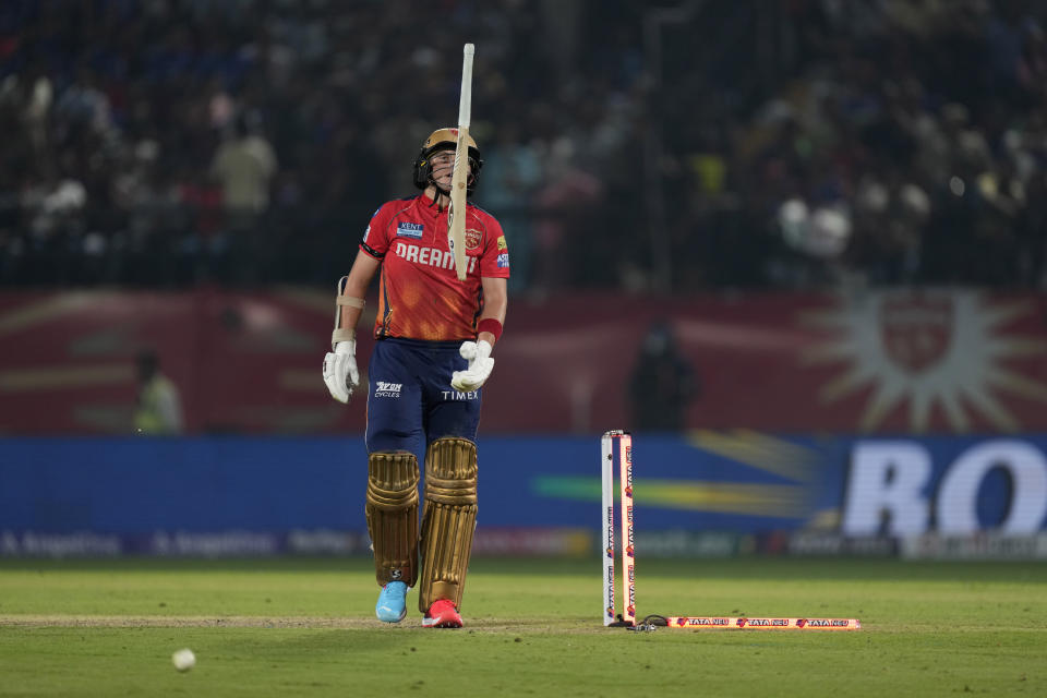 Punjab Kings' captain Sam Curran reacts after getting bowled out by Royal Challengers Bengaluru's Lockie Ferguson during the Indian Premier League cricket match between Punjab Kings and Royal Challengers Bengaluru in Dharamshala, India, Thursday, May 9, 2024. (AP Photo /Ashwini Bhatia)