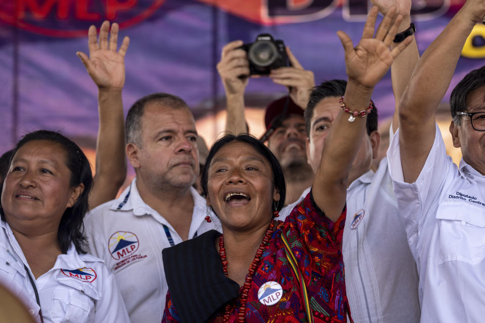 Indigenous leader Thelma Cabrera, center, who had hoped to become Guatemala's next president, waves during the Movement for the Liberation of the People closing campaign rally, in Guatemala City, Thursday, June 22, 2023. The country's electoral tribunal barred Cabrera from running. Guatemalans go to the polls on June 25. (AP Photo/Moises Castillo)