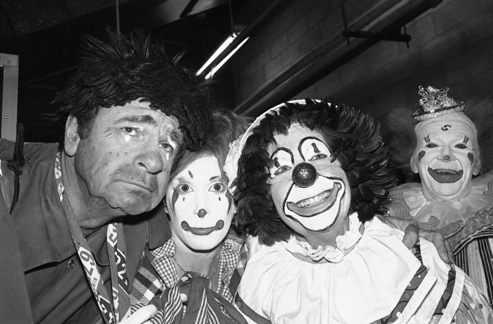 <p>Appearing as clowns for the charity-benefit opening of Ringling Brothers and Barnum & Bailey Circus in Los Angeles, July 17, 1975 is Walter Matthau, Lucy Saroyan, who is Matthau?s stepdaughter, and Mrs. George Allen, wife of the Washington Redskins? football coach. (AP Photo/Wally Fong) </p>