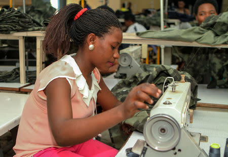 A worker prepares a garment at the the Utexrwa garment factory in Kigali, Rwanda April 17, 2018. Picture taken April 17, 2018. REUTERS/Jean Bizimana