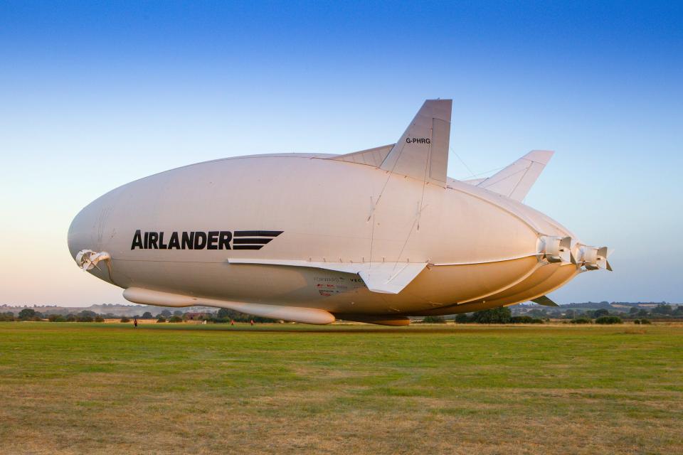 The Airlander 10 over a field