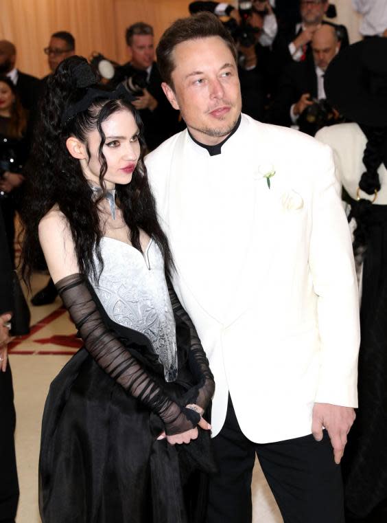 Grimes with Elon Musk at the 2018 Met Gala (Rex)