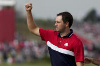Team USA's Patrick Cantlay reacts after winning on the 16th hole during a Ryder Cup singles match at the Whistling Straits Golf Course Sunday, Sept. 26, 2021, in Sheboygan, Wis. (AP Photo/Jeff Roberson)