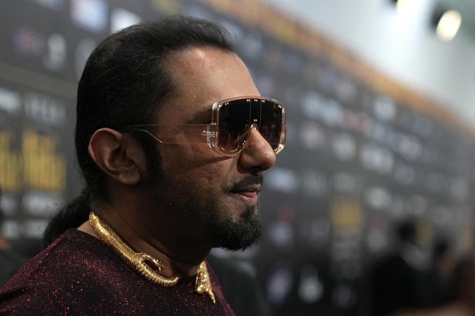 Indian musician Honey Singh poses on the green carpet ahead of the 22nd International Indian Film Academy (IIFA) awards in Abu Dhabi, United Arab Emirates, Friday, June 3, 2021. (AP Photo/Kamran Jebreili)