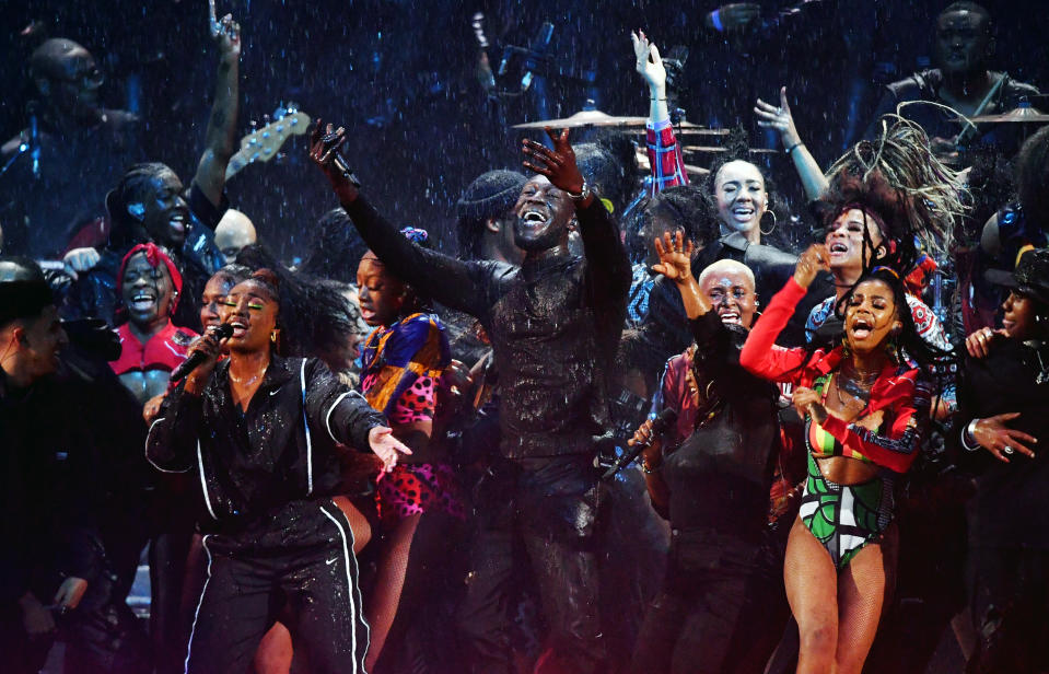 LONDON, ENGLAND - FEBRUARY 18: (EDITORIAL USE ONLY) Stormzy (C) performs during The BRIT Awards 2020 at The O2 Arena on February 18, 2020 in London, England. (Photo by Gareth Cattermole/Getty Images)