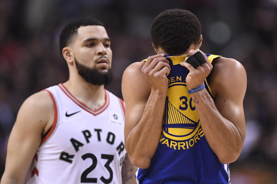 Golden State Warriors guard Stephen Curry (30) reacts in front of Toronto Raptors Fred VanVleet during the second half of Game 1 of basketball’s NBA Finals, Thursday, May 30, 2019, in Toronto. (Frank Gunn/The Canadian Press via AP)