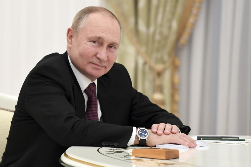 Russian President Vladimir Putin attends the talks with Iranian President Ebrahim Raisi in the Kremlin in Moscow, Russia, Wednesday, Jan. 19, 2022. (Pavel Bednyakov/Sputnik, Kremlin Pool Photo via AP)