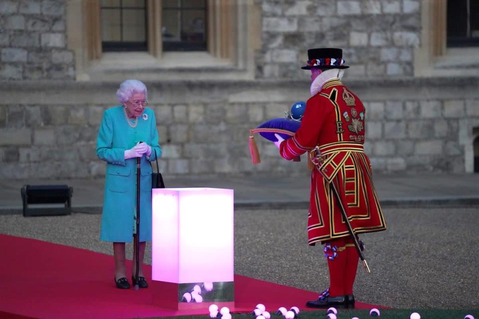 The Queen has symbolically led the lighting of the principal Platinum Jubilee beacon in a spectacular end to the first day of historic national commemorations celebrating her 70-year-reign (Steve Parsons/PA) (PA Wire)