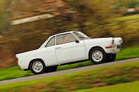 <p>Modern BMW enthusiasts might be alarmed to discover, if they didn’t know already, that their favourite manufacturer was once saved from almost certain oblivion by a tiny car with a <strong>697cc</strong> two-cylinder engine mounted behind the rear axle.</p><p>Available mostly as a saloon but also as a coupé (pictured) and a cabriolet, the 700 found <strong>nearly 190,000 buyers</strong> in six years – more than enough to make the company’s financial calamity a thing of the past. There has never been another BMW like it, but if it hadn’t existed there might never have been another BMW at all.</p>