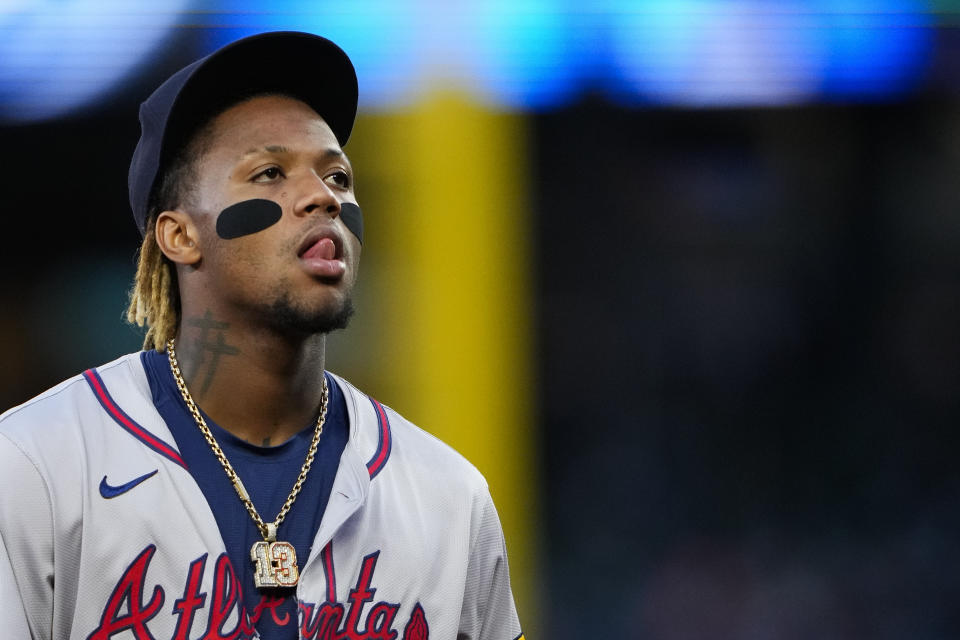 Atlanta Braves right fielder Ronald Acuña Jr. walks back to the dugout after the fifth inning of a baseball game against the Seattle Mariners, Tuesday, April 30, 2024, in Seattle. (AP Photo/Lindsey Wasson)
