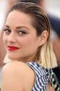 <p>Marion Cotillard nailed the rooty wet-look trend with her slicked-back bob. The star's cherry red lips popped against otherwise minimal make-up. </p>