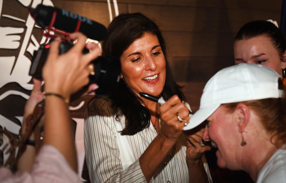 Republican presidential hopeful Nikki Haley brought her campaign to the Plankowner Brewing Company in Boiling Springs on Thursday, Sept. 7, 2023. After the event Nikki Haley took time sign items for guests, here, Haley takes the time to sign a hat for a guest.