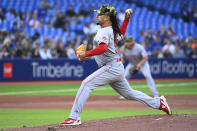 Cincinnati Reds' Luis Castillo pitches to a Toronto Blue Jays batter during the first inning of a baseball game Friday, May 20, 2022, in Toronto. (Jon Blacker/The Canadian Press via AP)