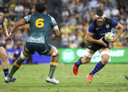 Argentina's Marcos Kremer, right, runs at Australia's Rob Leota during the Rugby Championship test match between the Pumas and the Wallabies in Townsville, Australia, Saturday, Sept. 25, 2021. (AP Photo/Tertius Pickard)